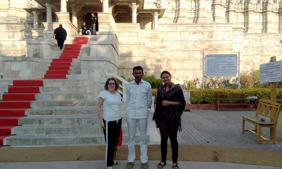 our happy customers  for  jodhpur full day tour  bacground is jaswant thada the pace where king's grave were kept.  